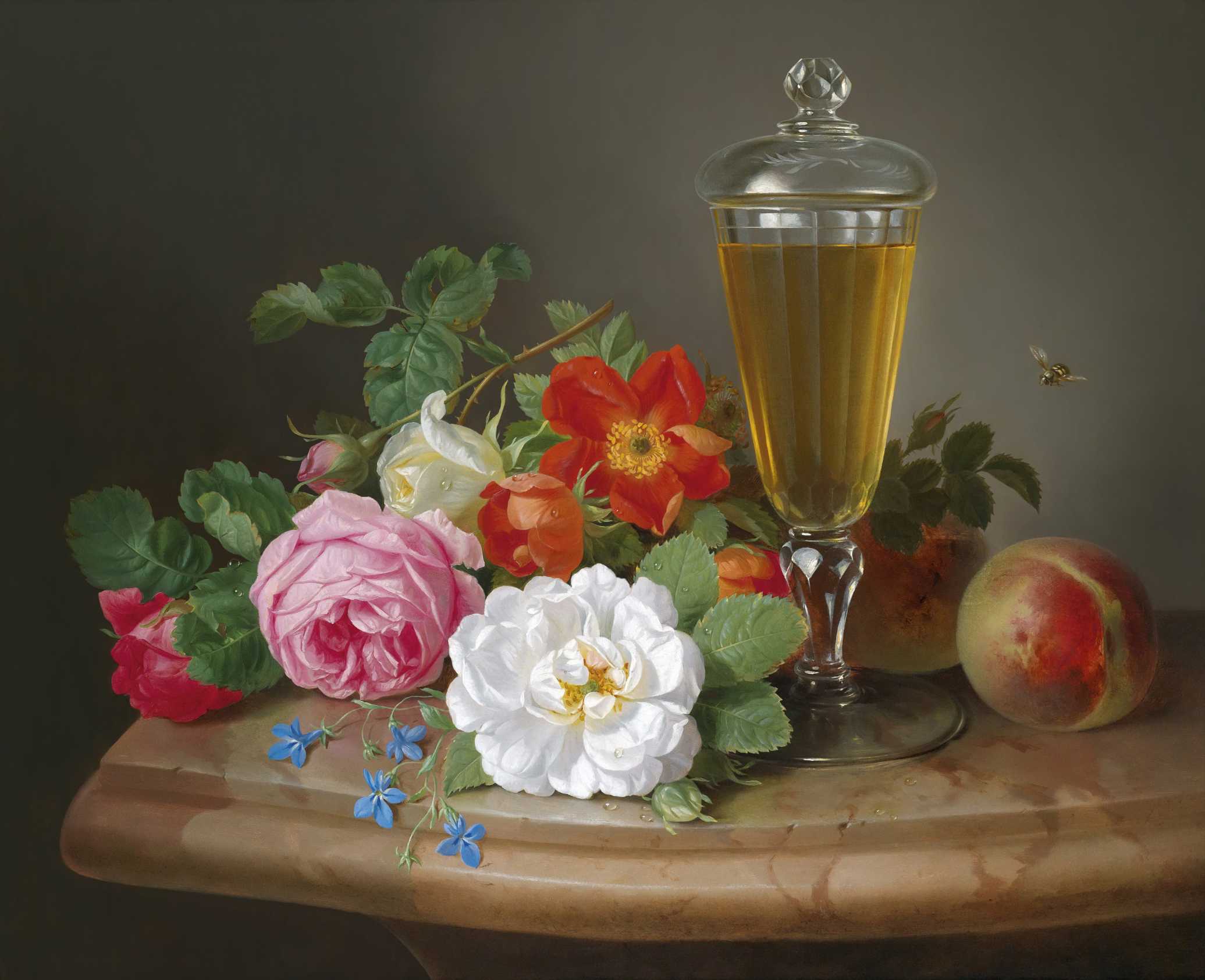 Glass with wine and roses