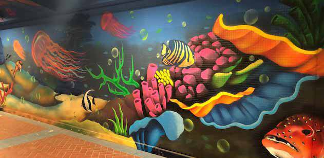 Underwater Sea Life Graffiti Wall Art featuring vibrant marine creatures, corals, and ocean waves in a colorful, contemporary art style.